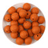 Round golden ochre silicone beads on a white plate, Master Maker Crafts wholesale supplies Ohio DIY Craft Warehouse