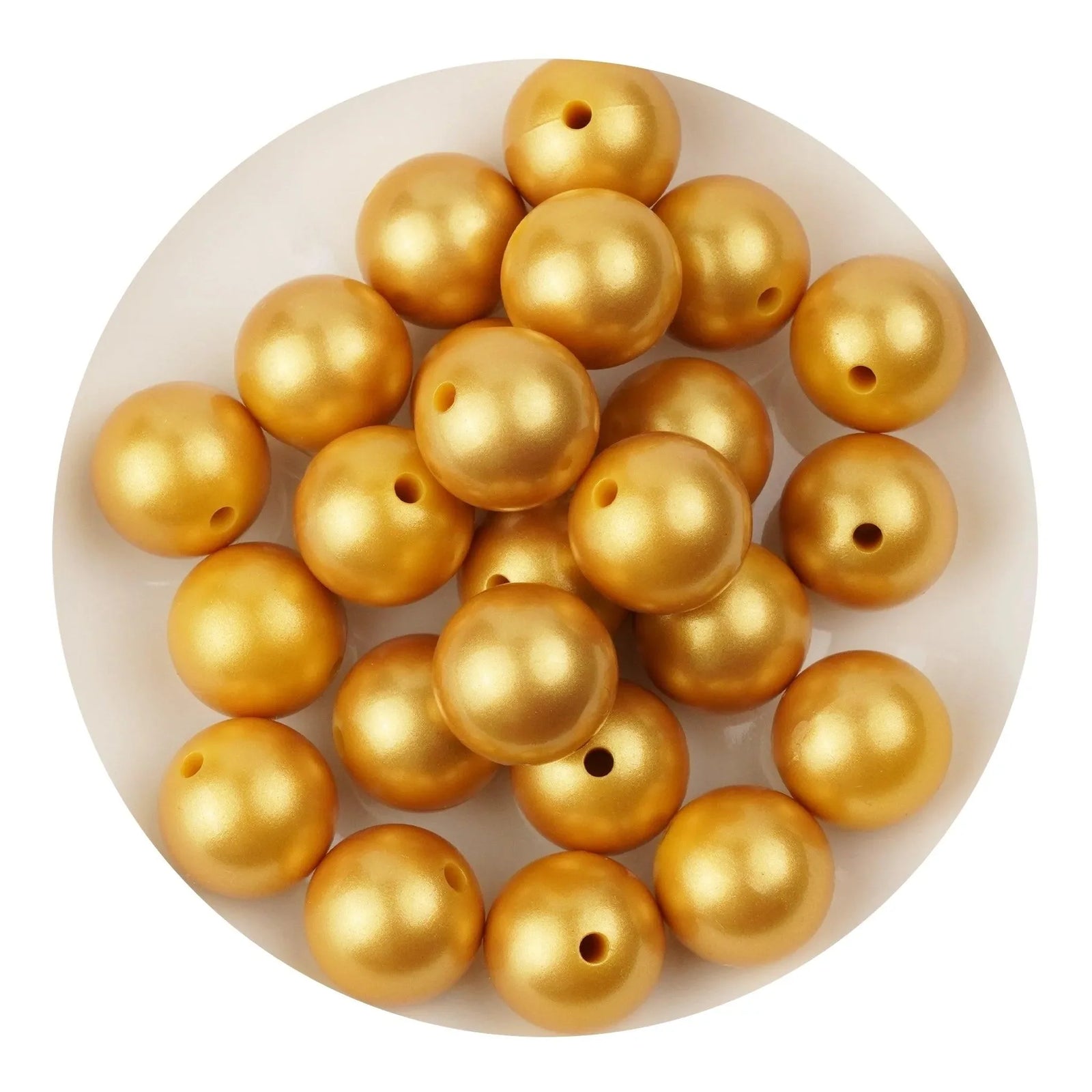 Master Maker Crafts metallic gold silicone beads on white plate, wholesale craft supplies Ohio